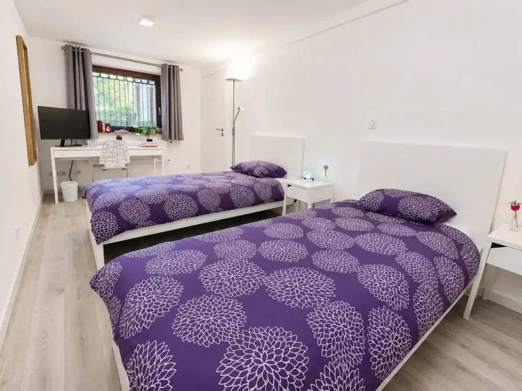 Twin bedroom with desk, furnished studio near Basel EuroAirport