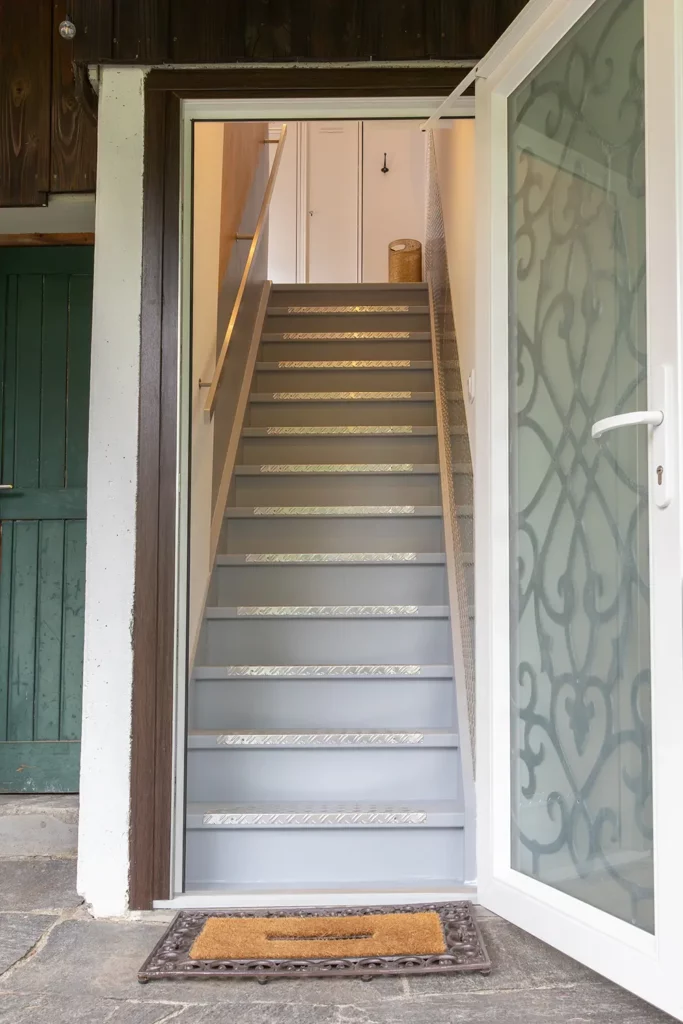 Private entrance staircase to Studio 2 loft — Les Trois Cœurs Saint-Louis Alsace